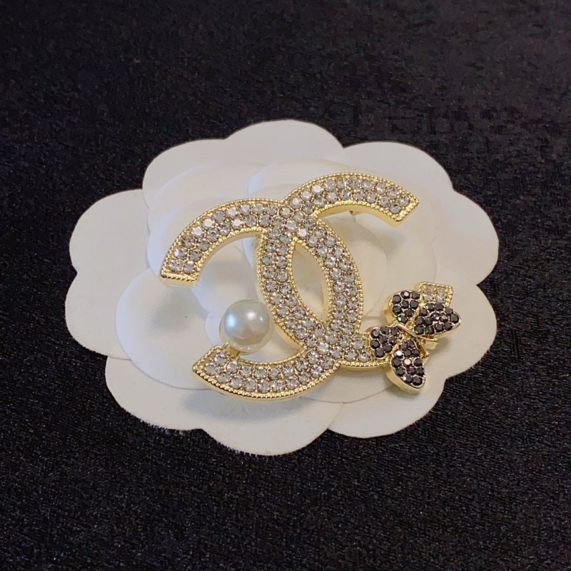 Ch**el brooches